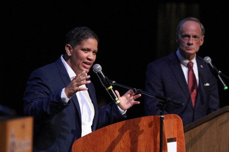 Incumbent U.S. Sen. Tom Carper (right) and challenger for the Democratic nomination, Kerri Evelyn Harris, debate at the Cab Calloway School for the Arts in Wilmington.