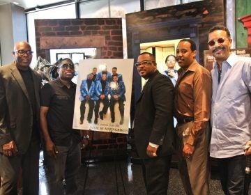 Current members of the Dixie Hummingbirds and Ira Tucker Jr. (right), announce celebrations to mark the group's 90th anniversary. (Kimberly Paynter/WHYY)