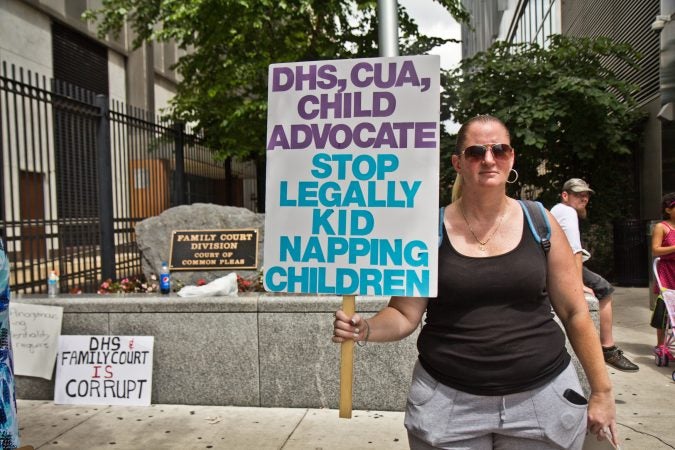 Miltreda Kress organized a protest outside Family Court. (Kimberly Paynter/WHYY)