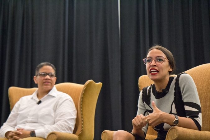Alexandria Ocasio-Cortez, a New York congressional candidate (right) joined Kerri Evelyn Harris, who is seeking the Democratic nomination to run for the U.S. Senate Friday. (Kimberly Paynter/WHYY)