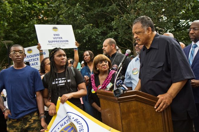 Rev. Jesse Jackson speaks on Independence Mall in Philadelphia Monday. (Kimberly Paynter/WHYY)