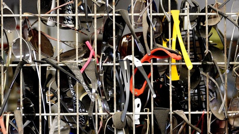 Dust is settled on racks of sunglasses in one of the  booths at Zern's Farmers Market in Gilbertsville, Pa. (Bastiaan Slabbers for WHYY)