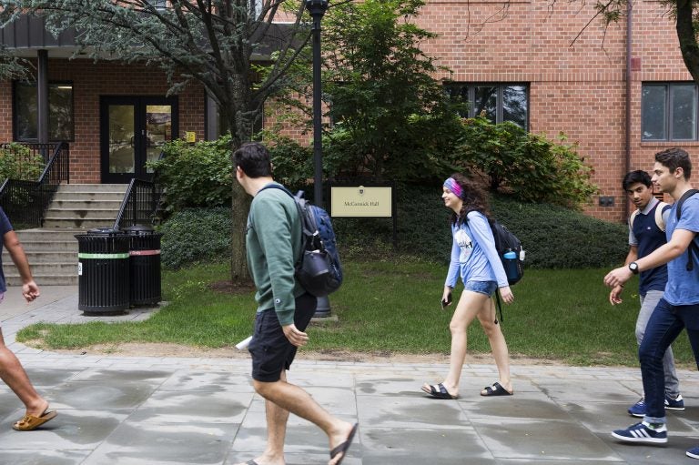 Incoming freshmen at the University of Scranton walk past McCormick Hall, one of three campus buildings that will soon be renamed in response to the recent report on Pennsylvania priest abuse.
(Rachel Wisniewski)