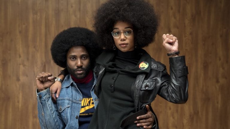 Ron (John David Washington) and Patrice (Laura Harrier) strike power poses in Spike Lee's BlacKkKlansman.
(David Lee/Focus Features)