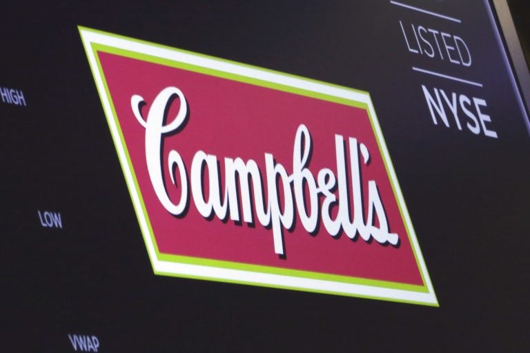 The logo for Campbell's Soup appears above a trading post on the floor of the New York Stock Exchange, Friday, May 18, 2018. Campbell Soup plunged 10.9 percent after announcing that its CEO, Denise Morrison, was retiring effectively immediately. (Richard Drew/AP Photo)