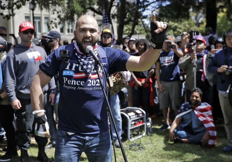 In this April 27, 2017, file photo, right wing group Patriot Prayer leader Joey Gibson speaks during a rally in support of free speech in Berkeley, Calif. The conflict between Patriot Prayer and the so-called 
