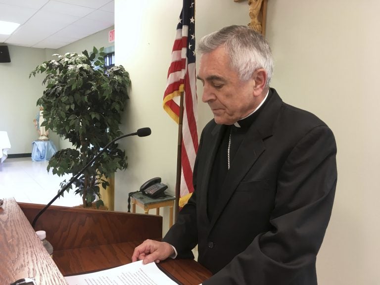 The Most Rev. Ronald Gainer, the Roman Catholic bishop of the diocese of Harrisburg, Pa., discusses child sexual abuse by clergy and a decision by the diocese to remove names of bishops going back to the 1940s after concluding they did not respond adequately to abuse allegations, during a Wednesday, Aug. 1, 2018, news conference in Harrisburg, Pa. The bishop apologized to victims and said the diocese is posting an online list of 71 priests and others in the church accused of the abuse. Following the Erie, Pa., diocese, the Harrisburg diocese is the second Pennsylvania diocese to get ahead of a roughly 900-page grand jury report that could be made public in August 2018, which the Pennsylvania Supreme Court said found more than 300 