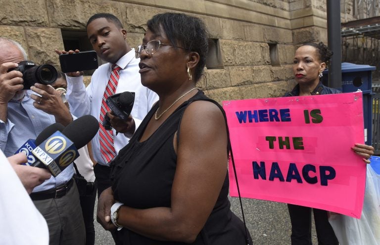 Carmen Ashley, great aunt of Antwon Rose Jr. talks with reporters outside of the courthouse following a hearing for East Pittsburgh police officer Michael Rosfeld on Wednesday, Aug. 22, 2018, in Pittsburgh.  Rosfeld is charged in the June 19 shooting death of Rose, an unarmed teenager as he fled a traffic stop. (AP Photo/Don Wright)