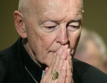FILE - In this Nov. 14, 2011 file photo, Cardinal Theodore McCarrick prays during the United States Conference of Catholic Bishops' annual fall assembly in Baltimore. Seton Hall University has begun an investigation into potential sexual abuse at two seminaries it hosts following misconduct allegations against ex-Cardinal McCarrick and other priests. (AP Photo/Patrick Semansky, File)