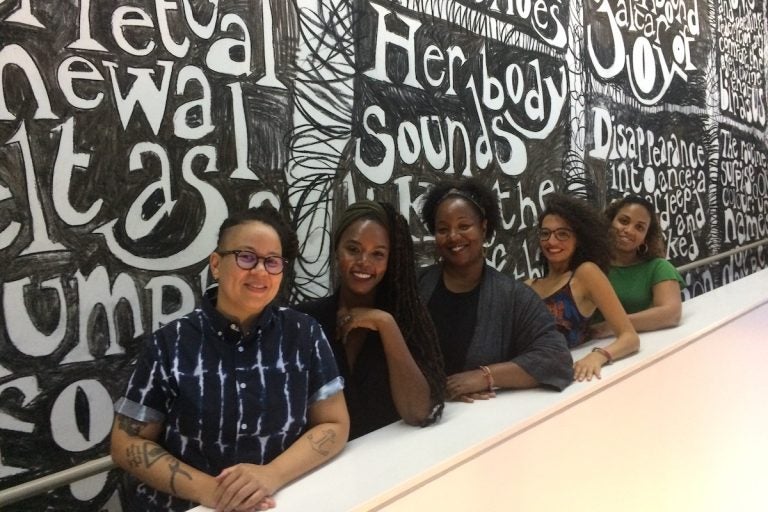 Blackstar organizers Meg Onli, Patrice Worthy, Maori Karmael Homes, Nehad Khader, and Denise Beek in front of an artwork by Jade Montserrat at the Institute for Contemporary Art. Blackstar highlights the work of black filmmakers from around the world. (Credit: Jen Kinney)