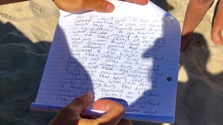 The message found within a bottle that washed ashore in Harvey Cedars, Long Beach Island in late July. (Image courtesy of Brian Devlin/Harvey Cedars Beach Patrol)