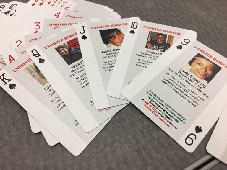 Police in Delaware will distribute decks of playing cards that have pictures and stories of unsolved murders in hopes that inmates will join their effort to solve the crimes. (Mark Eichmann/WHYY)