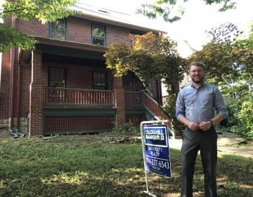 State College borough planning director Ed LeClear in front of one of the houses sold through the Neighborhood Sustainability Program.
(EMILY REDDY / WPSU)