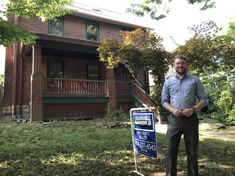 State College borough planning director Ed LeClear in front of one of the houses sold through the Neighborhood Sustainability Program.
(EMILY REDDY / WPSU)