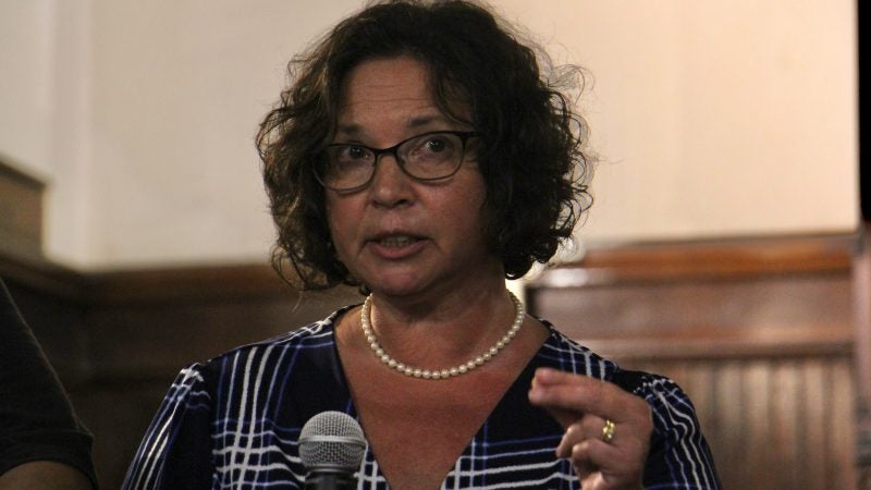 Sheila Linz, a psychiatric nurse practioner who provides psychiatric support in homeless shelters across Camden, speaks during a panel discussion on homelessness. (Emma Lee/WHYY)