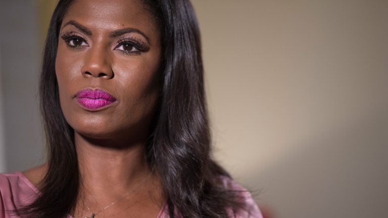 Television personality and former White House staffer Omarosa Manigault Newman listens during an interview with The Associated Press, Tuesday, Aug. 14, 2018, in New York. (AP Photo/Mary Altaffer)