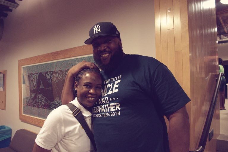 Toney Morse with one of his grown foster children, LaTonya Myers.  (Liz Tung/WHYY)