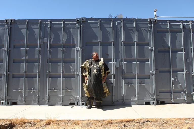 Oran Z. Belgrave, founder of the now defunct Oran Z's Black Facts & Wax Museum in Los Angeles, stands in front of the shipping containers that have held most of the contents of his independent African-American history museum since it closed in 2011.
(Samir S. Patel/Atlas Obscura)