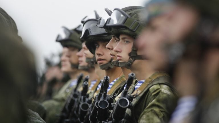 Russian troops and their Belarusian counterparts awaiting orders during joint military exercises in Belarus last year. Next month, Russia will embark on another joint military exercise — this time on a much larger scale and in collaboration with China and Mongolia.
(Sergei Grits/AP/)