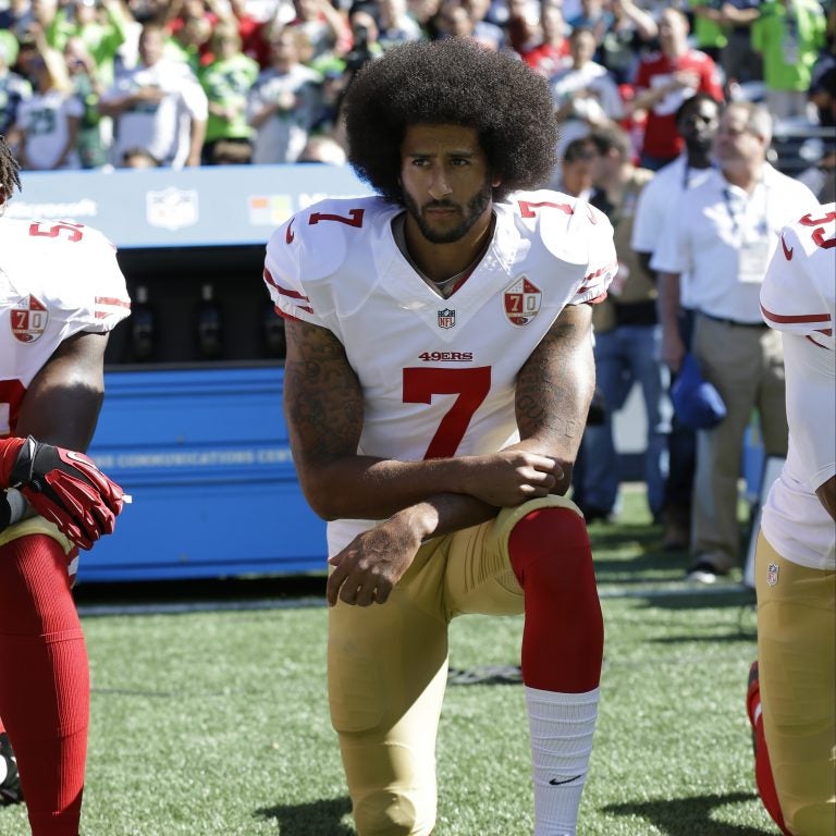 San Francisco 49ers' Colin Kaepernick kneels during the national anthem before an NFL football game against the Seattle Seahawks, in Seattle, in September 2016. (Ted S. Warren/AP)