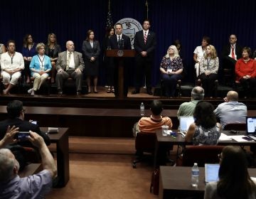 Pennsylvania Attorney General Josh Shapiro speaks during a news conference at the Pennsylvania Capitol on Tuesday. A Pennsylvania grand jury says its investigation of clergy sexual abuse identified more than 1,000 child victims in records in six Roman Catholic dioceses.
Matt Rourke/AP