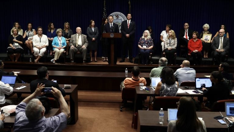 Pennsylvania Attorney General Josh Shapiro speaks during a news conference at the Pennsylvania Capitol on Tuesday. A Pennsylvania grand jury says its investigation of clergy sexual abuse identified more than 1,000 child victims in records in six Roman Catholic dioceses.
Matt Rourke/AP