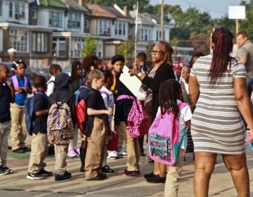 Students line up outside Joseph Pennell Elementary on the first day of school. (Kimberly Paynter/WHYY)