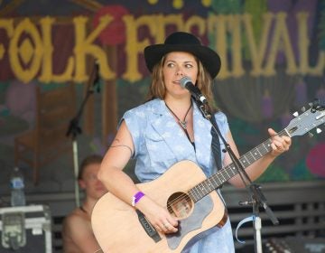 Toronto-based singer Melanie Brulée performs for the crowd gathered at the Tank Stage. (Jonathan Wilson for WHYY)