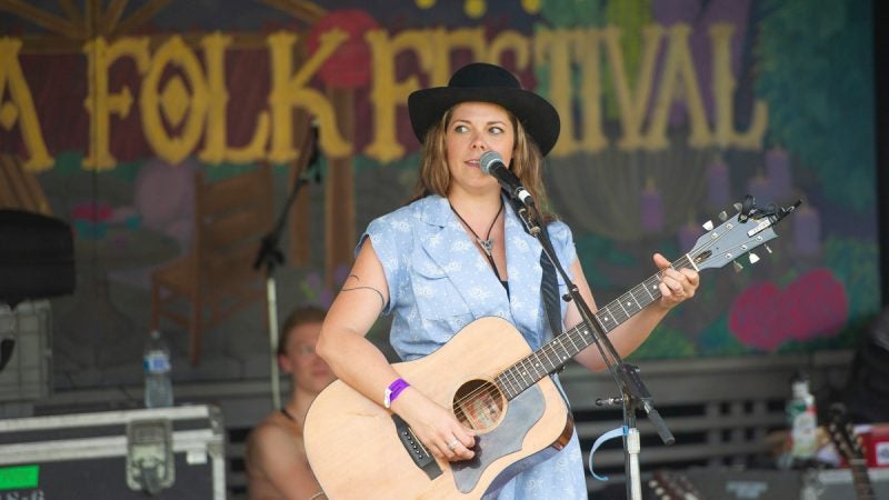 Toronto-based singer Melanie Brulée performs for the crowd gathered at the Tank Stage. (Jonathan Wilson for WHYY)