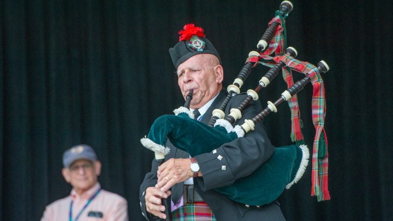 Bagpipe master Dennis Hangey performed at the opening of the evening concerts on the Martin Main Stage. (Jonathan Wilson for WHYY)