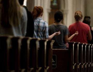 Parishioners worship during Mass at St. Paul Cathedral, the mother church of the Pittsburgh Diocese, last week.