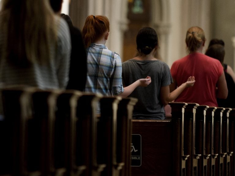 Parishioners worship during Mass at St. Paul Cathedral, the mother church of the Pittsburgh Diocese, last week.