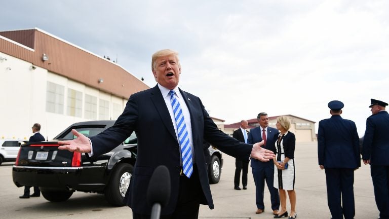 President Trump speaks before a political rally in West Virginia on Tuesday. He lamented the fate of his former campaign chairman Paul Manafort. He called Manafort's guilty verdict 