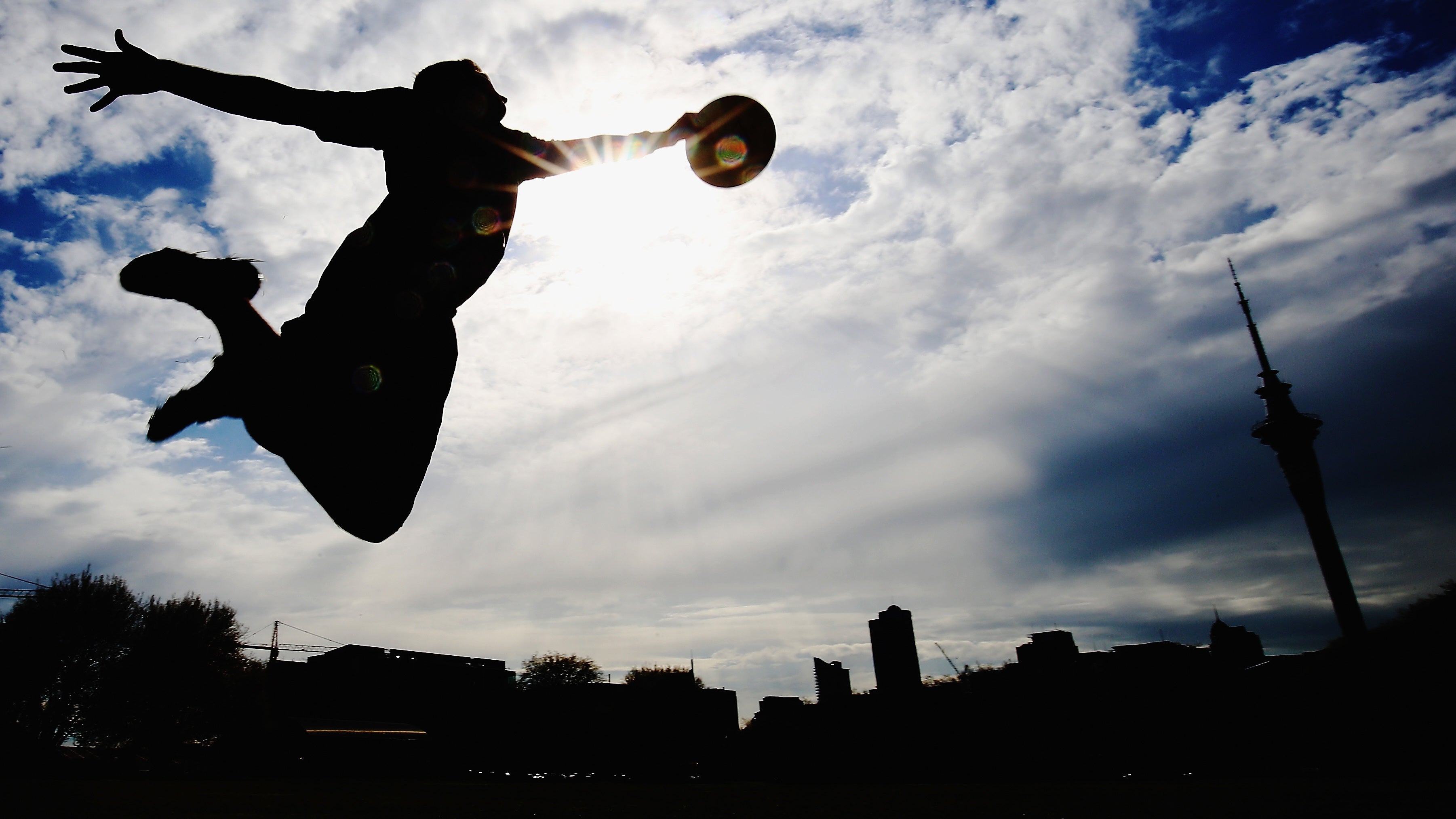 New Zealand Ultimate Frisbee player Zev Fishman dives for a frisbee during a photoshoot in October 2015.