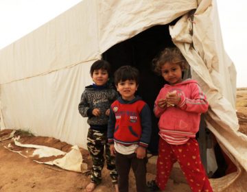 MAFRAQ, Jordan — Syrian refugee children at a settlement near the Jordan-Syria border on April 26, 2018. (© Mohammad Abu Ghosh/Xinhua via ZUMA Wire)