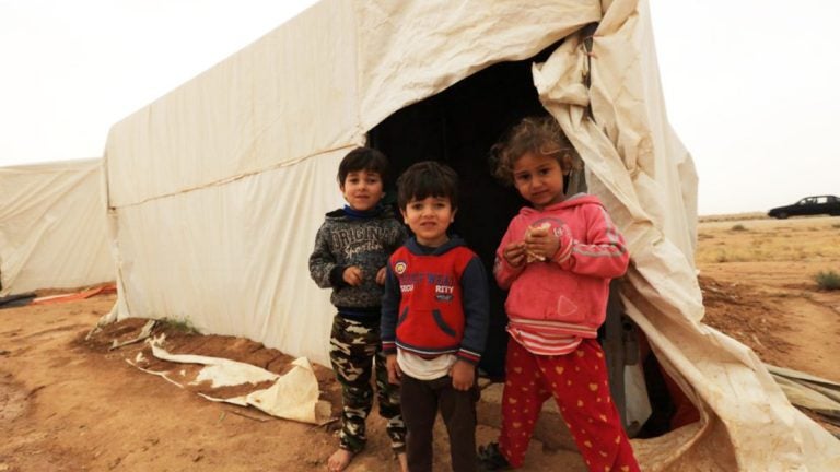 MAFRAQ, Jordan — Syrian refugee children at a settlement near the Jordan-Syria border on April 26, 2018. (© Mohammad Abu Ghosh/Xinhua via ZUMA Wire)