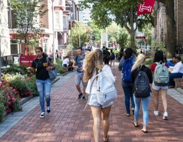 Students walk on the Temple University campus in Philadelphia. Temple has started a master’s degree in sport business, among the 41,446 degree or certificate programs colleges and universities have added since 2012. (Matt Rourke/The Associated Press)