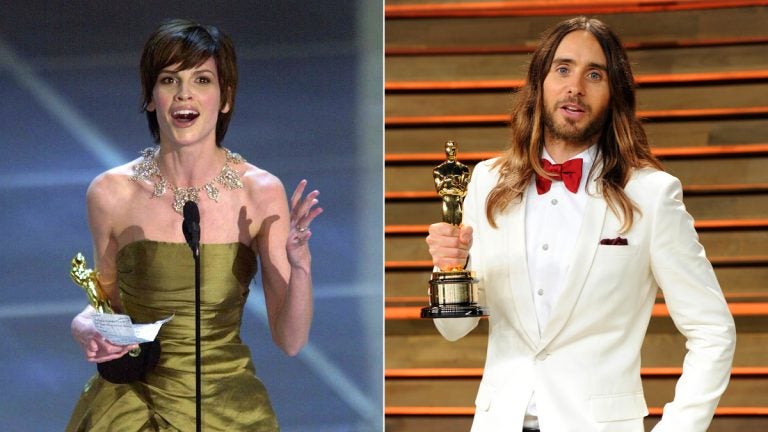 In this combination photo, Hilary Swank accepts the Oscar for best actress for her role in 