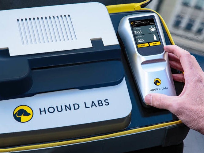 California Highway Patrol Sgt. Jaimi Kenyon blows into a alcohol breathalyzer during a demonstration of devices used to test drivers suspected of impaired driving May 2017, in Sacramento, Calif. Lawmakers and police are hoping new devices will be developed to effectively test for marijuana use by drivers. (Rich Pedroncelli/AP)