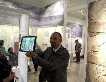 Iraqi artist Yaroub Al-Obaidi gives a tour of the Penn Museum's new Middle East Galleries. He'll also be reading this weekend at an event that brings together Iraqis and veterans of the Iraq War. (Jen Kinney)