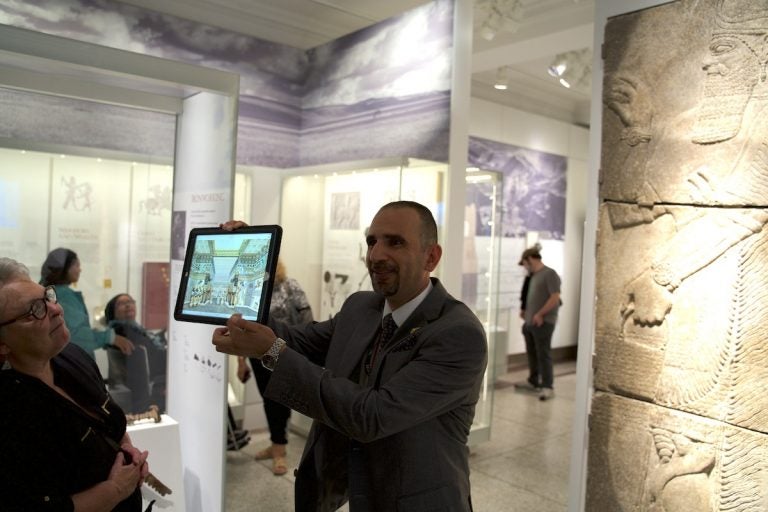 Iraqi artist Yaroub Al-Obaidi gives a tour of the Penn Museum's new Middle East Galleries. He'll also be reading this weekend at an event that brings together Iraqis and veterans of the Iraq War. (Jen Kinney)