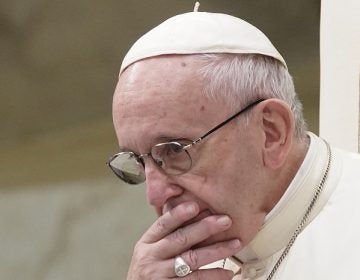 FILE - In this Aug. 22, 2018 file photo, Pope Francis is caught in pensive mood during his weekly general audience in the Pope Paul VI hall, at the Vatican. Archbishop Carlo Maria Vigano, with his 11-page testimony, have thrown Francis' 5-year papacy into crisis. (AP Photo/Andrew Medichini)