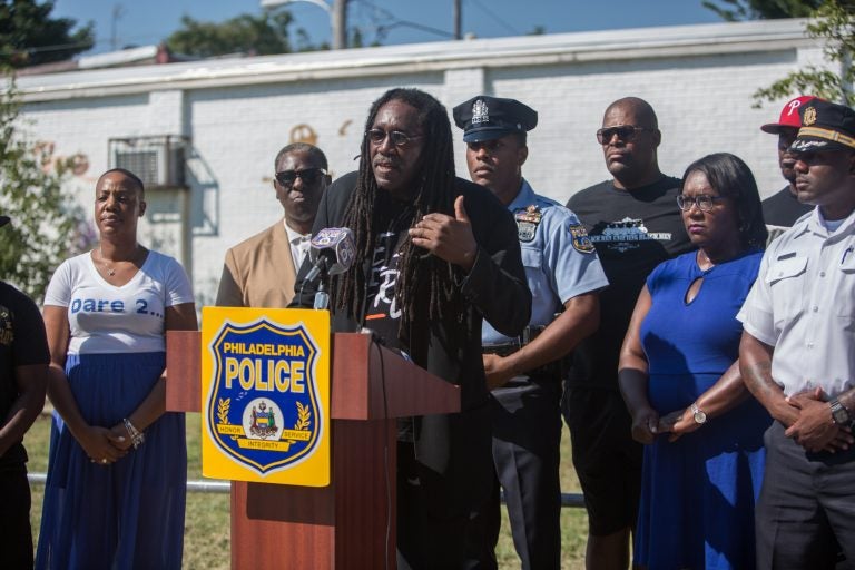 J. Jondhi Harrell is the executive director of The Center for Returning Citizens, which has partnered with the Philadelphia Police Department in an initiative to link employers with potential employees on Southwest Philadelphia street corners. (Emily Cohen for WHYY)