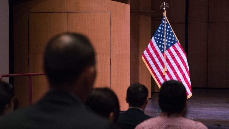 Newly sworn-in U.S. citizens gather for a naturalization ceremony in Alexandria, Va., in August. A potential trial over a new 2020 census citizenship question is set to start on Nov. 5 in New York City. (Claire Harbage/NPR)