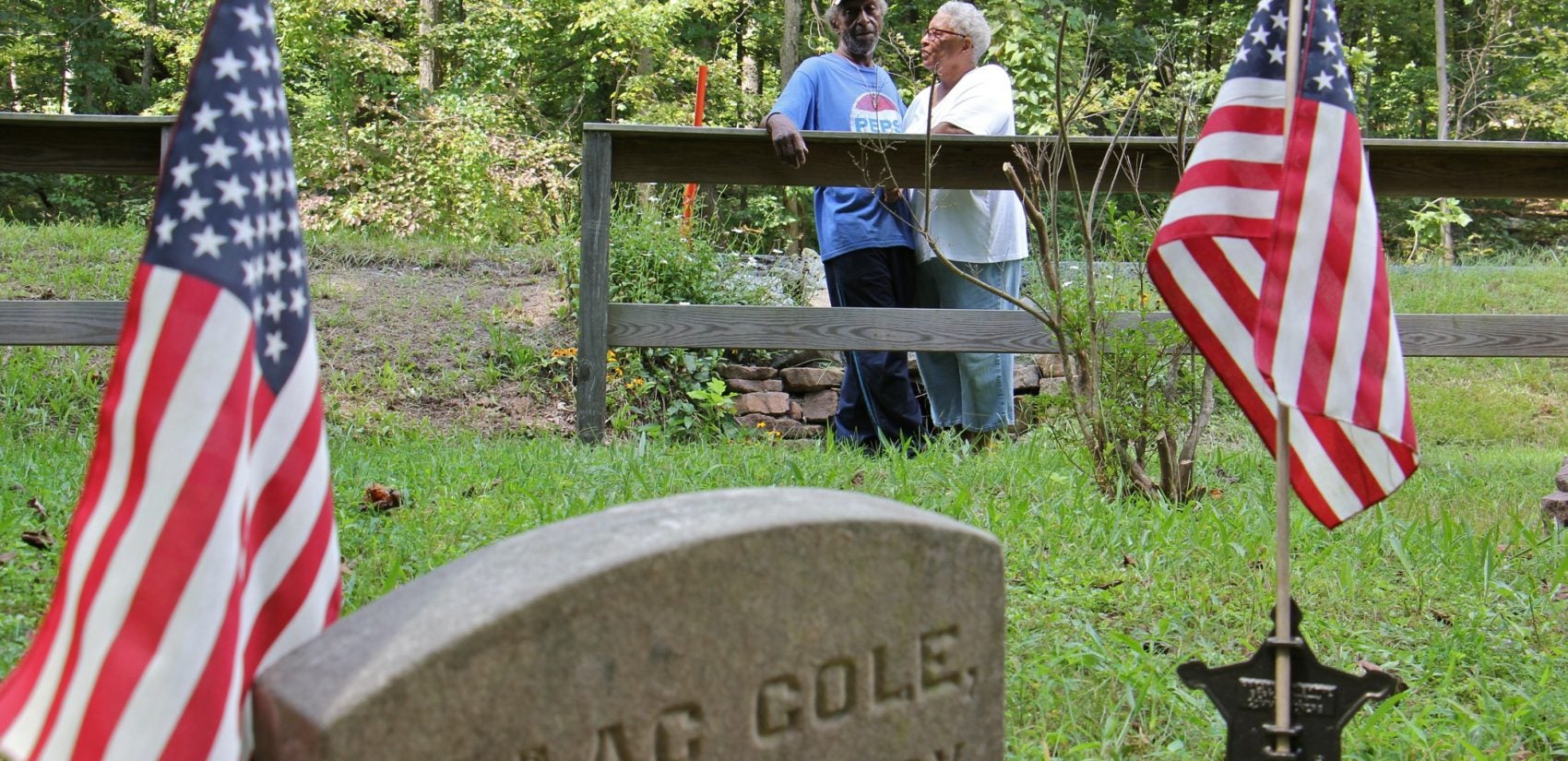 John Cole and his wife, Barbara, visit the tiny graveyard where his great grandfather Isaac Cole, is buried. Isaac Cole was a Civil War veteran and worked as a woodsman for the nearby Hopewell Furnace.