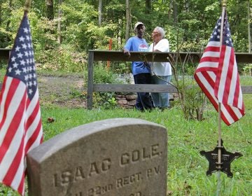John Cole and his wife, Barbara, visit the tiny graveyard where his great grandfather Isaac Cole, is buried. Isaac Cole was a Civil War veteran and worked as a woodsman for the nearby Hopewell Furnace.