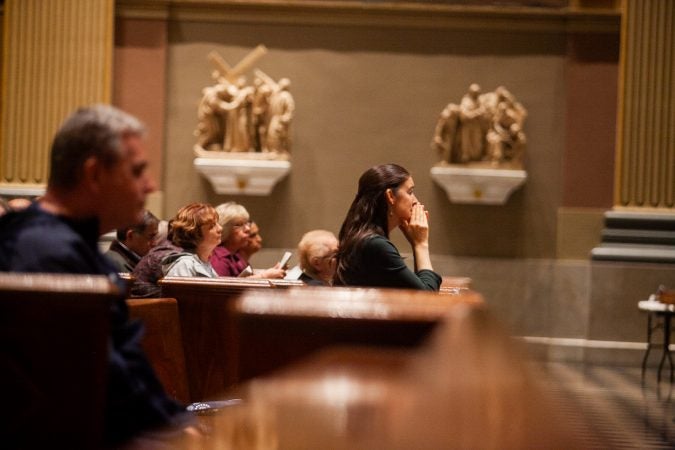 Philadelphia area Catholics attended a mass Friday evening at the Basillica of Saints Peter and Paul for a night of prayer and reflection following the recent revelations of wide spread sexual abuse by priests across the state. (Brad Larrison for WHYY)