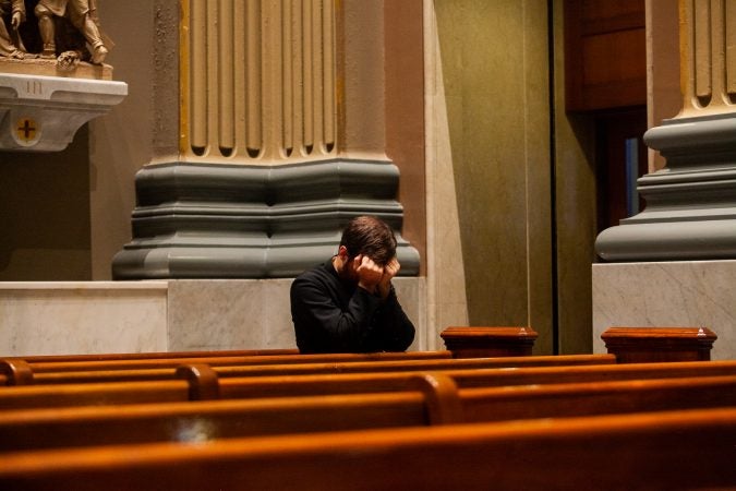 Clergy attended a mass Friday evening at the Basillica of Saints Peter and Paul for a night of prayer and reflection following the recent revelations of wide spread sexual abuse by priests across the state. (Brad Larrison for WHYY)