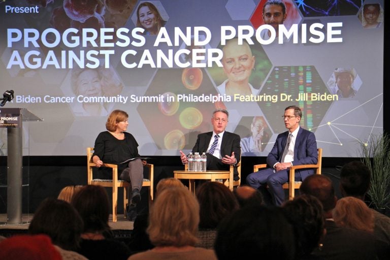 Dr. Dario Altieri (center), president and CEO of the Wistar Institute, talks about the road to FDA approval for cancer treatments during a discussion with Abramson Cancer Center Director Robert Vonderheide (right).
The discussion was moderated by Maiken Scott (left), host of WHYY's The Pulse. (Emma Lee/WHYY)