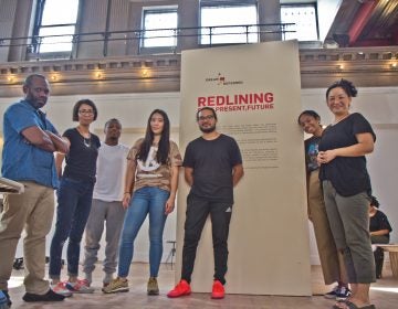 The Little Giant Creative Team during the setup of the Dream Deferred exhibit at 6th and Spring Garden Streets in Philadelphia. (Kimberly Paynter/WHYY)